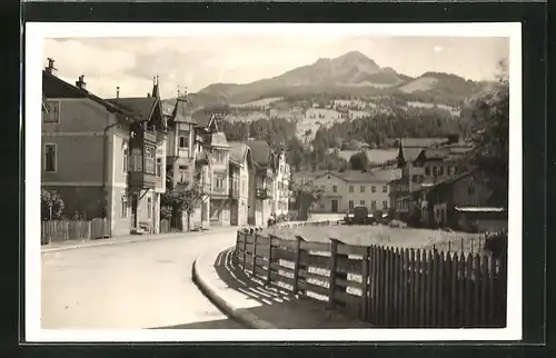 AK St, Johann, Banhofstrasse mit Häusereihe