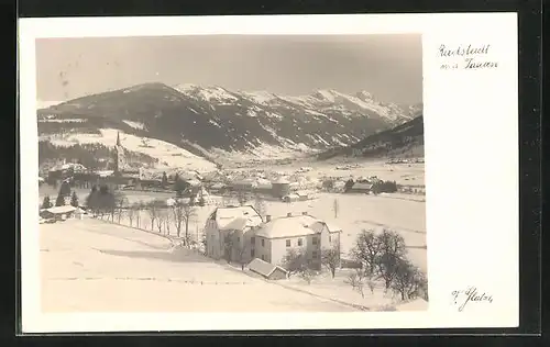 AK Radstadt, Verschneite Ortschaft gegen den Tauern