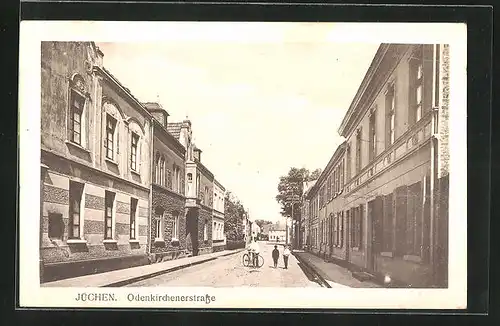 AK Jüchen, Odenkirchenerstrasse und Mann mit Fahrrad