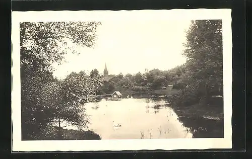 AK Bad Polzin, Blick auf den Brodesee und Kirche