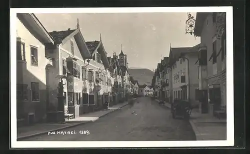 Foto-AK Matrei, Denkmal in Strassenpartie