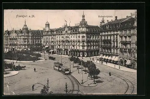 AK Frankfurt a. M., Bahnhofplatz mit Apotheke und Strassenbahn