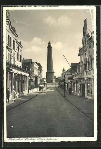 AK Borkum, Strandstrasse mit Blick zum Leuchtturm