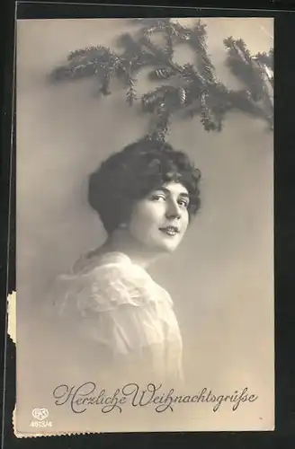 AK Junge Damezur Seite blickend, Tannenzweig, Weihnachtsgruss