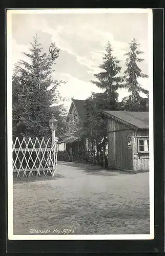 AK Neu-Afrika bei Templin, Holzhütten am Feldweg