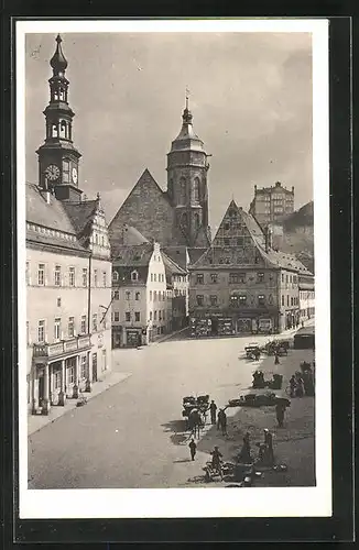 AK Pirna, Marktplatz mit Uhrenturm und Geschäften
