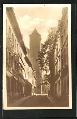 AK Freiberg /Sachsen, Strassenpartie mit Blick zur Kirche