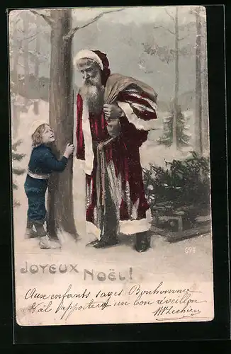 AK Weihnachtsmann mit kleinem Jungen im verschneiten Wald, Weihnachtsgruss
