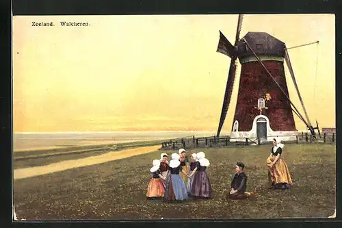 Künstler-AK Photochromie Nr. 2934: Zeeland, Walcheren, Mädchen in Tracht vor einer Windmühle