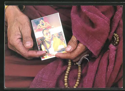 AK Monk holding Dalai Lama Card