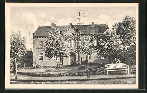 AK Osterburg /Altm., St. Georg Hospital mit blühenden Bäumen
