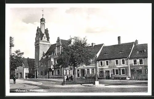 AK Güsten, Marktplatz mit Geschäften und Rathaus