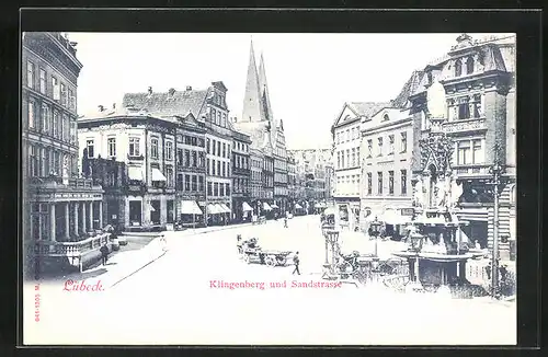 AK Lübeck, Klingenberg und Sandstrasse mit Geschäften und Denkmal