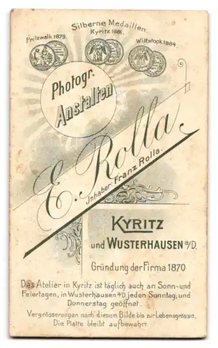 Fotografie E. Rolla, Kyritz, Portrait charmanter Herr mit Schnurrbart und Krawatte im Jackett