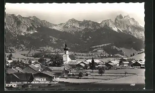 AK Tannheim, Ortsansicht mit der Kirche und Blick auf Rot Flüh und Gimpel