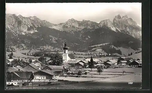AK Tannheim, Blick zur Kirche im Ort mit Rot Flüh und Gimpel
