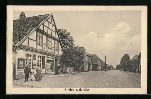 AK Ahlden a. d. Aller, Strassenpartie mit Geschäft