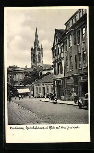 AK Euskirchen, Bahnhofstrasse mit Herz Jesu Kirche