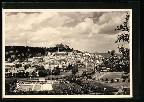 AK Marburg, Ortsansicht mit Sportplatz und Kirchen