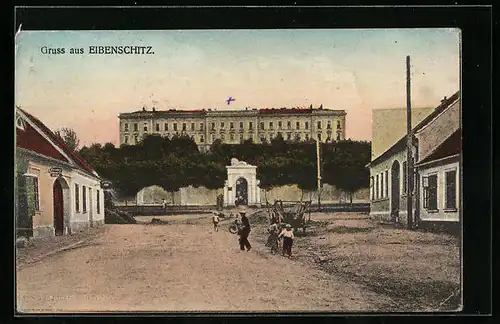 AK Eibenschitz, Strassenpartie mit grossem Gebäude