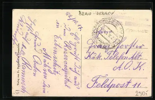 AK Eibenschitz, Strassenpartie mit grossem Gebäude