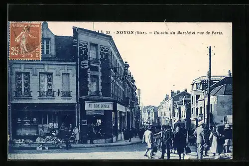 AK Noyon, Un coin du Marché et rue de Paris