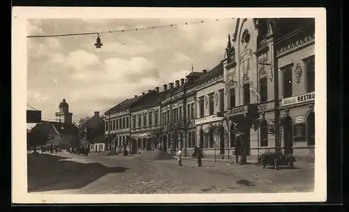 AK Pohorelice, Strasse mit Geschäftshäusern