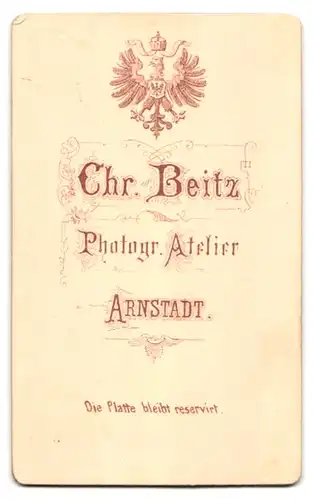 Fotografie Chr. Beitz, Arnstadt, Herr mit Vollbart und Brille blickt zur Seite