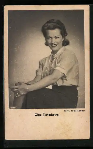 AK Schauspielerin Olga Tschechowa posiert im Sitzen