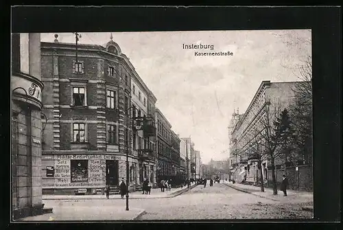 AK Insterburg, Kasernenstrasse mit Militär-Bedarfsartikel-Geschäft Emil Wetkus