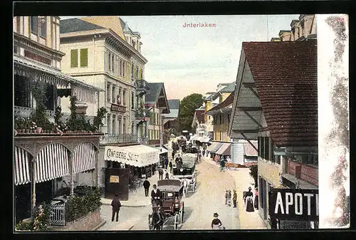 AK Interlaken, Strassenpartie mit Confiserie Seitz, Apotheke u. Pferdewägen