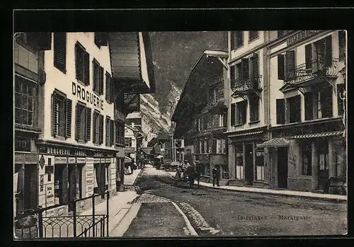 AK Interlaken, Strasse Marktgasse mit Restaurant und Drogerie