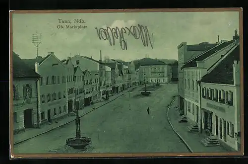 AK Tann /Ndb., Oberer Marktplatz mit Geschäften und Brunnen