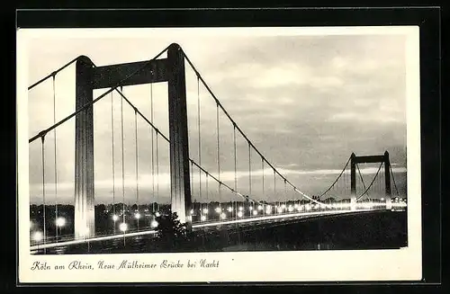 AK Köln /Rhein, Neue Mülheimer Brücke bei Nacht