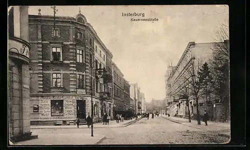 AK Insterburg, Kasernenstrasse mit Militär-Bedarfsartikel-Geschäft