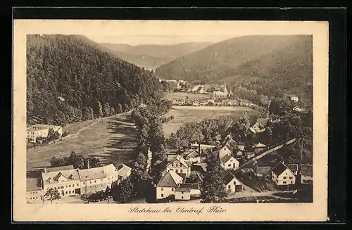 AK Stutzhaus i. Thür., Blick über die Ortschaft im Tal gelegen