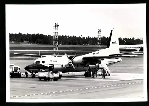 Fotografie Flugzeug Fokker 27, Passagierflugzeug der MSA, Kennung 9M-AOJ