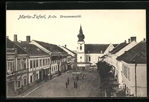 AK Maria-Taferl, Strassenpartie mit Geschäften und Kirche