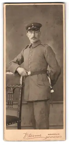 Fotografie Blesius, Hameln, Ostertorwall 3, Soldat in Uniform vom 164. Regiment