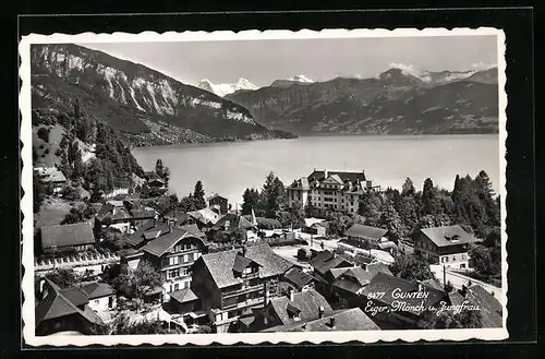 AK Gunten, Ortsansicht mit Eiger, Mönch und Jungfrau