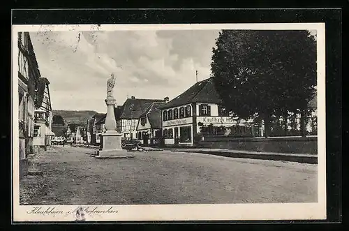 AK Kleukheim, Strassenpartie mit Denkmal