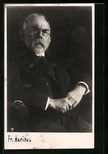 AK Fr. Herites mit Zwickerbrille in einem Sessel sitzend