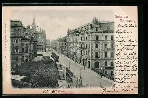 AK Reichenberg / Liberec, Strassenpartie mit Brücke