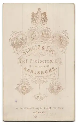 Fotografie Schulz & Suck, Karlsruhe, Kaiserstrasse 227, Seitenportrait einer älteren Frau mit Duttfrisur