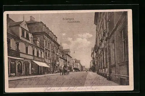 AK Erlangen, Hauptstrasse mit Geschäften und Pferdewagen