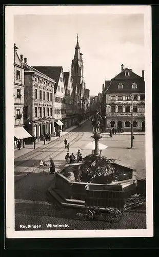 AK Reutlingen, Wilhelmstrasse mit Apotheke