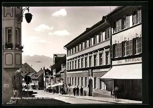 AK Murnau, Hauptstrasse mit Geschäften und Krottenkopf