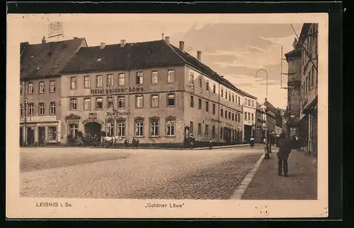 AK Leisnig i. Sa., Strassenpartie mit dem Hotel goldener Löwe