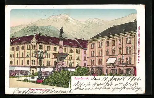 Goldfenster-AK Innsbruck, Margarethenplatz, Gebäude mit leuchtenden Fenstern