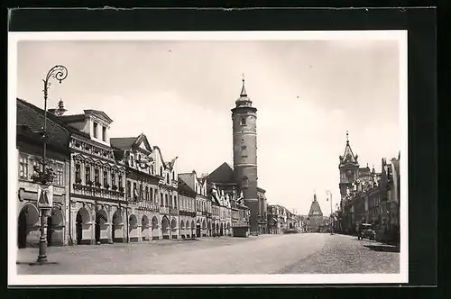 AK Domazlice, Prachtstrasse mit Turm